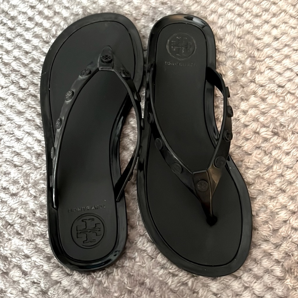Black jelly tory burch flip flops.